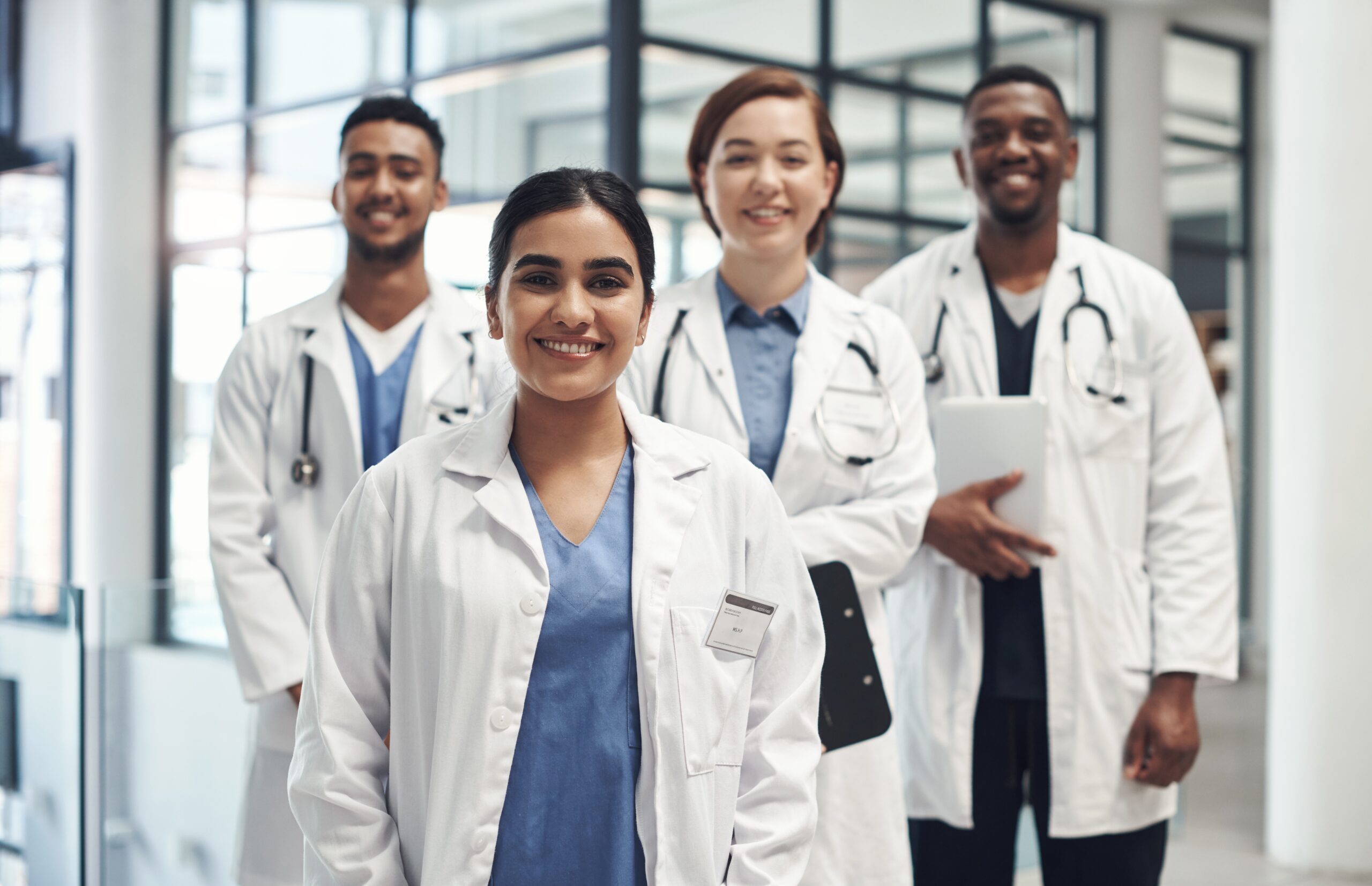 Doctors,,Smile,And,Portrait,In,Hospital,Standing,Together,For,Healthcare, fall-prevention-program